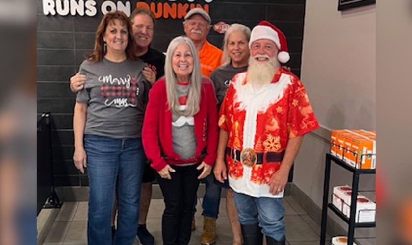 A equipe durante a festa de Natal. (Foto: Reprodução/AG News)