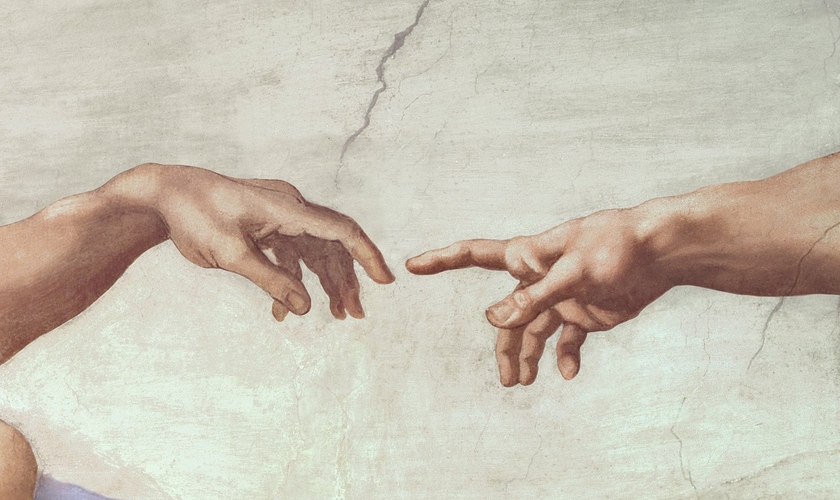 Deus estendendo a mão para Adão; detalhe da obra-prima de Michelangelo na Capela Sistina. (Imagem: Domínio público)