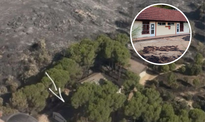Vista aérea mostra a área devastada pelo incêndio ao redor do acampamento cristão Pinos Reales, cujos edifícios permaneceram intactos. (Foto: EEA)