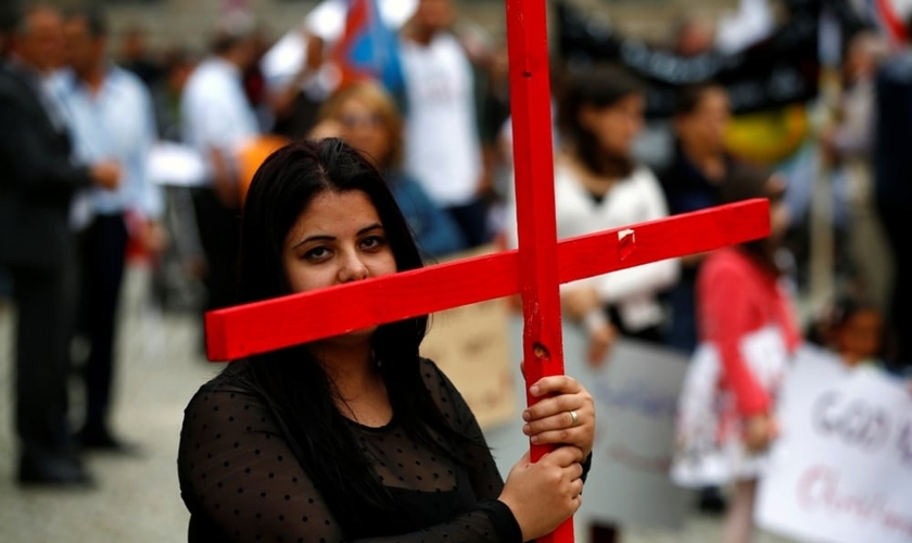 As igrejas domésticas cristãs são consideradas ilegais, e são frequentemente confrontadas com ameaças de prisão. (Foto: Reuters/Thomas Peter)
