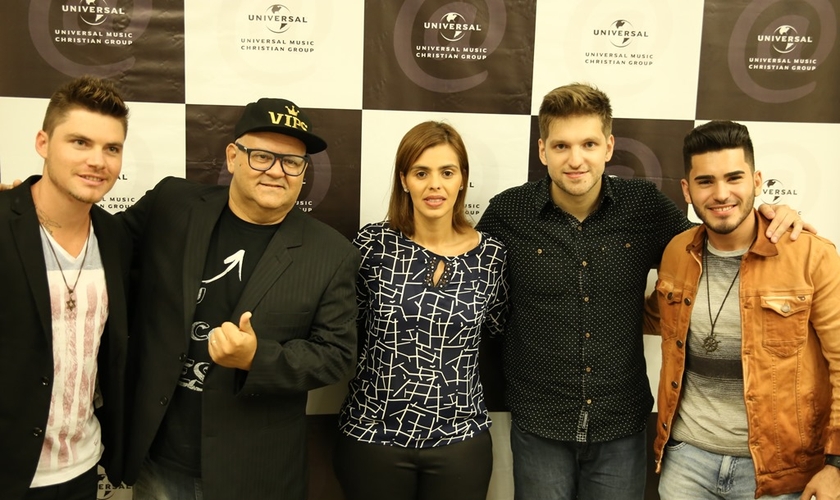 ara abrir o evento, foi transmitido um vídeo apresentando o single de cada um dos novos contratados. (Foto: UMCG).