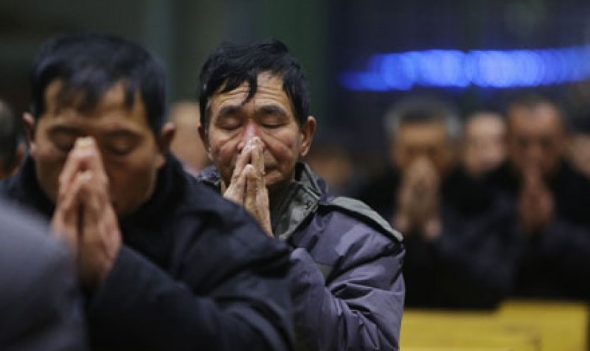 Cristão chinês em momento de oração em Xiliulin, na China. (Photo: CNS)