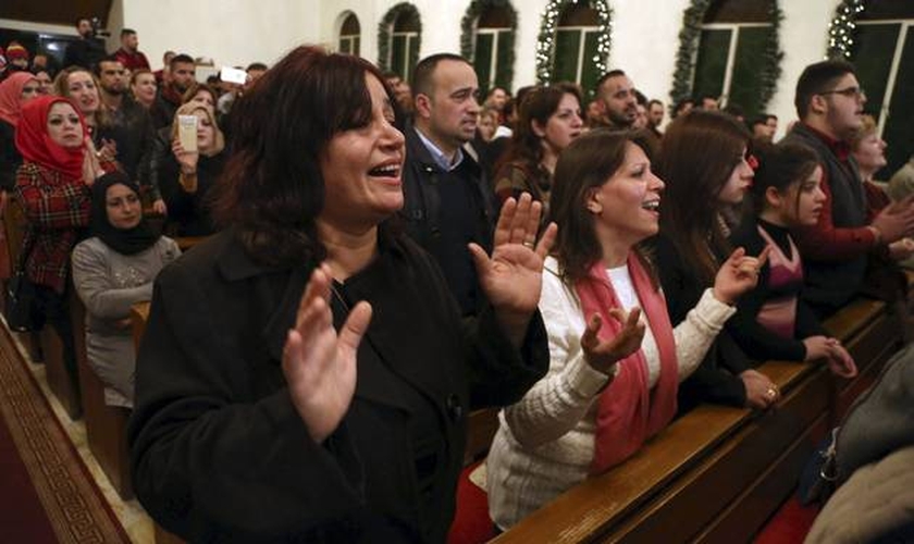Cristãos no Iraque. (Foto: AP Photo/Karim Kadim)