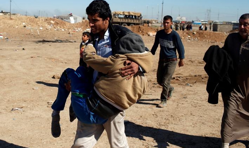 Mahmoud foi salvo por cristãos durante sua fuga do Estado Islâmico. (Foto: Reuters).