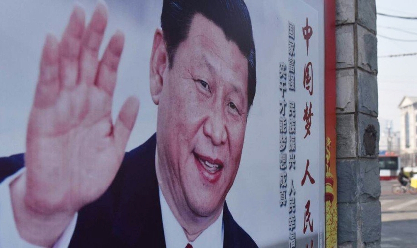 Outdoor em Pequim com a imagem de Xi Jinping, presidente e secretÃ¡rio-geral do Partido Comunista da China. (Foto: Greg Baker/AFP)