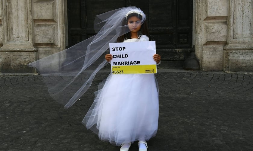 Campanha da Anistia Internacional contra o casamento infantil, em 2016. (Foto: Getty Images)