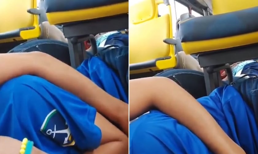 Mãe e filha deitadas no chão de um ônibus na Avenida Brasil. (Foto: Reprodução/Instagram/O Globo)