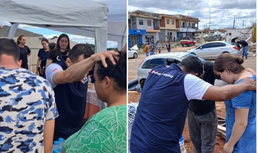 Moradores recebem oração em tenda montada por igreja em Rio Bonito do Iguaçu. (Foto: Universal)