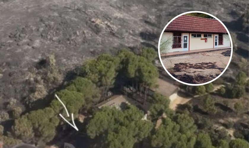 Vista aérea mostra a área devastada pelo incêndio ao redor do acampamento cristão Pinos Reales, cujos edifícios permaneceram intactos. (Foto: EEA)