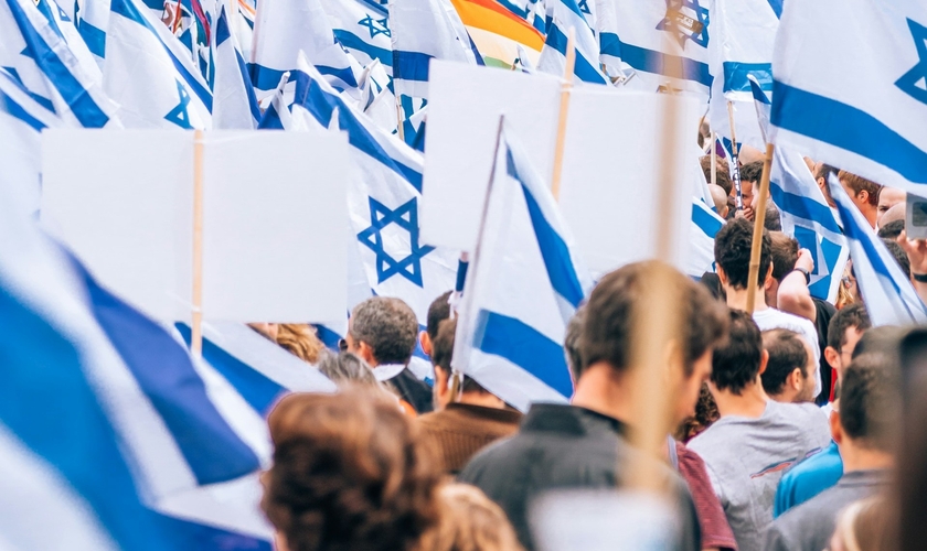 Bandeiras de Israel durante manifestação em apoio ao país. (Foto representativa: Yoav Aziz/Unsplash)