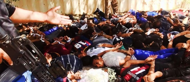 Terroristas Iraquianos divulgam imagens de execução Terroristas Iraquianos divulgam imagens de execução