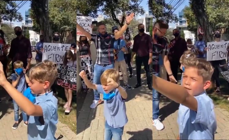 Crianças oram por doentes em frente a hospital e inspiram com sua fé; assista